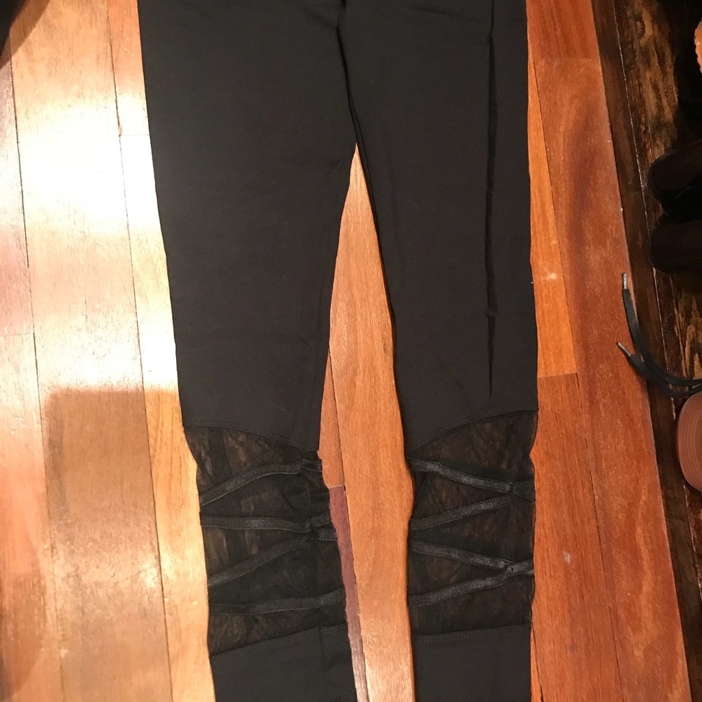 Nesh black leggings with mesh detail